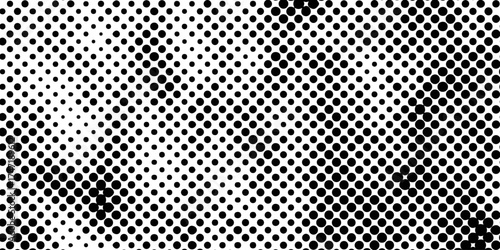 Abstract halftone pattern black dotted white background varying sized of black circles, dotted halftone gradient seamless pop art modern background of monochrome overlay design element.
