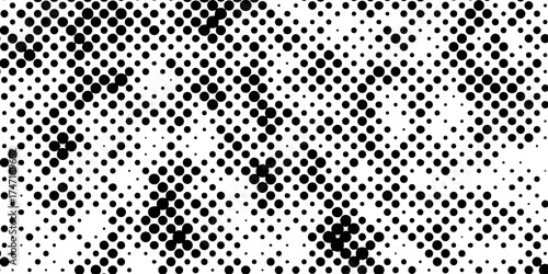 Abstract halftone pattern black dotted white background varying sized of black circles, dotted halftone gradient seamless pop art modern background of monochrome overlay design element.