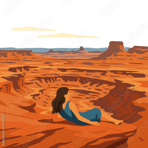 A girl in a blue dress lies on the rim of a crater in Canyonlands National Park, Utah