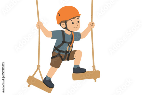 A small boy climbs in an adventure park wearing a helmet and safety gear