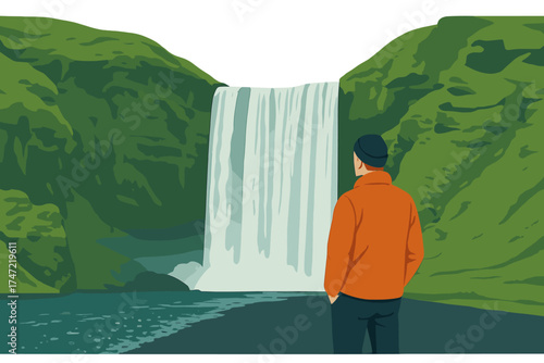 A man admiring the beauty of the iconic Skogafoss waterfall in Iceland, Europe