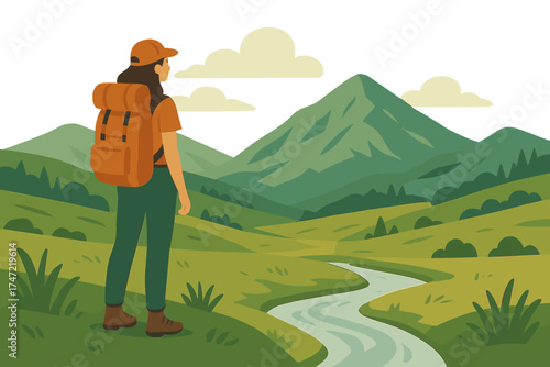 A female hiker stands by the small river, taking in the view of the wild valley