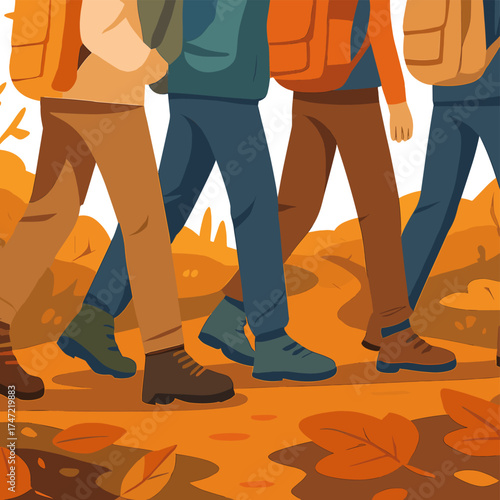 A group of tourists strolls along the autumn forest trail, their feet captured up close as they travel together