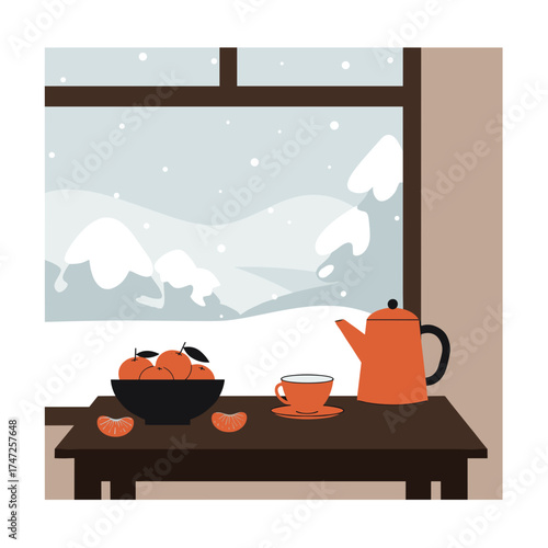 Cozy winter table setting with tea and oranges by the window  