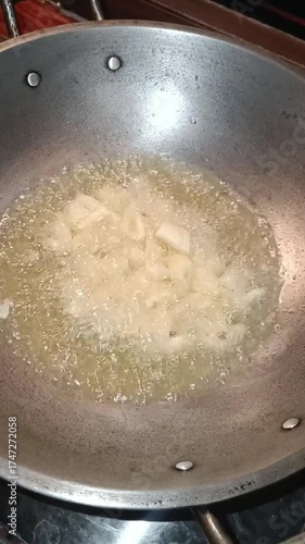 Sizzling Garlic in Hot Oil – Close-up Cooking Shot