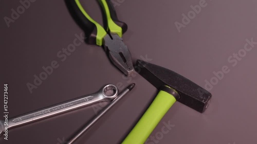 A set of building tools and instruments for repair in black and green colour. Must-have for men. Equipment for building. Repair tool kit. construction concept. gray background . High quality photo
