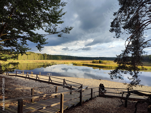 Fall landscape scenery at lake in forest. Sunset in National park, Poland 