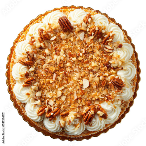 An elegant round cake decorated with swirls of white frosting whole pecans and a crunchy nut topping sits on a golden plate against a dark backdrop