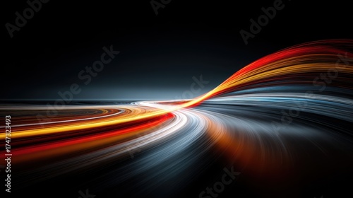 Abstract long exposure light trails against a dark background