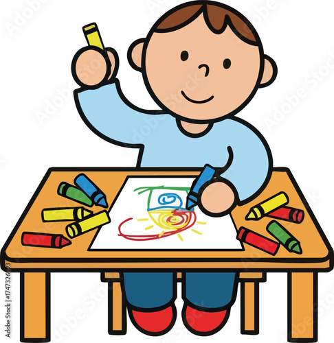 Young boy happily drawing and coloring at a wooden table.
