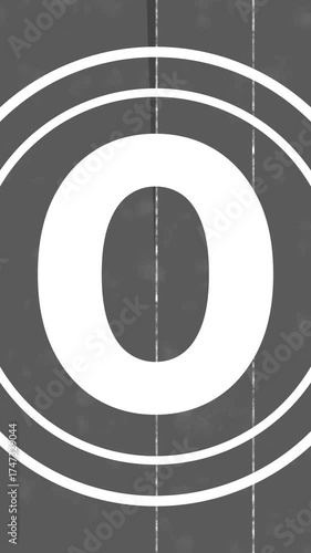 Classic film countdown animation. Vintage timer from 5 to 0 seconds with noise, scratches, and old reel texture. Vertical aspect.
