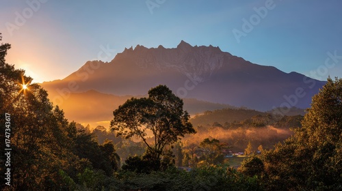 Majestic Mount Kinabalu Landscape at Sunrise With Trees and Fog
