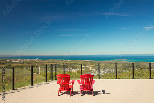 Ontario, Canada,gorgeous, inviting ,natural landscape view from the mountain on the village, sunny autumn day, blue sky, Georgian Bay, Lake Huron in background 