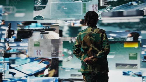 Wallpaper Mural Intelligence agency specialist scanning enemy rockets using digital videowall. African american woman using radar systems on laptop program to detect incoming ballistic missiles, camera A Torontodigital.ca