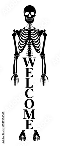 Skeleton figure with word Welcome for Halloween front door decoration on spooky night