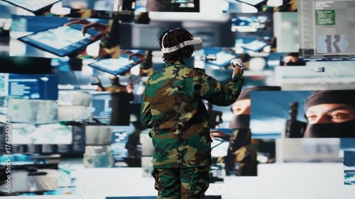 Wallpaper Mural Soldier providing combat support, looking at reconnaissance feeds using VR headset gear. Intelligence agency professional uses battlefield communication network and virtual reality tech, camera A Torontodigital.ca