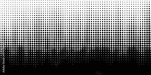 Abstract black and white halftone pattern with varying dot sizes creating a gradient effect