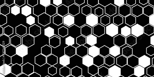 Geometric pattern of black and white hexagons creating a visually striking design for backgrounds