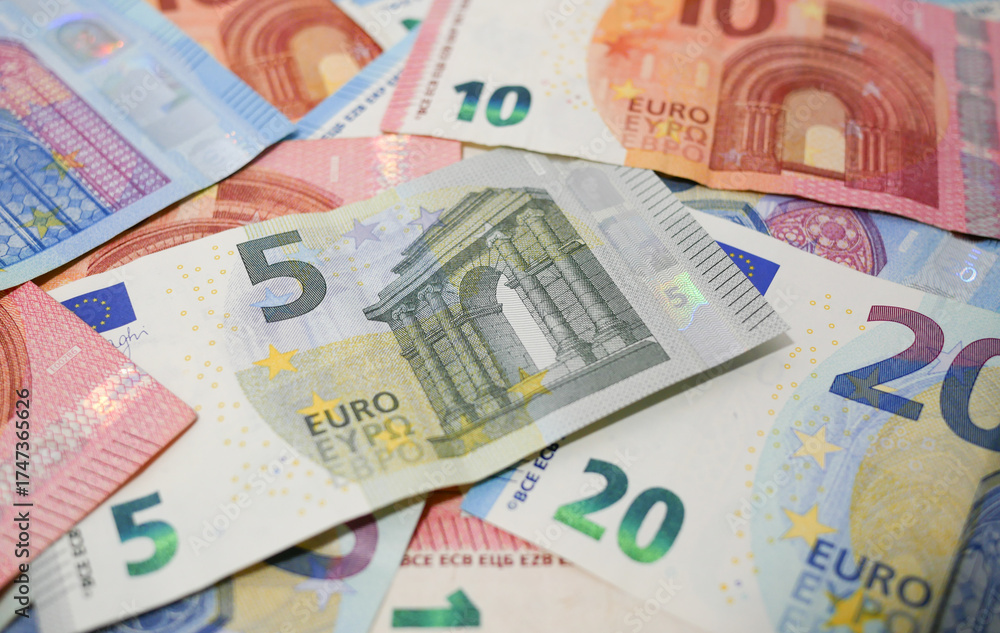 Obraz premium Euro banknotes background. Close up, shallow depth of field.