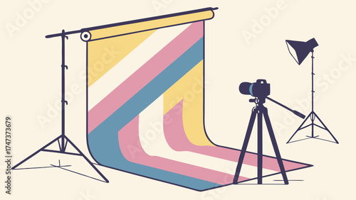 Studio Photography Setup Camera on Tripod with Striped Backdrop and Lighting.