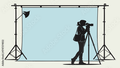 Studio Photographer Silhouette with Lighting and Backdrop.