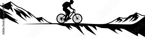 Mountain biker silhouette at sunrise with glowing sky and ridge outline for travel and adventure design use