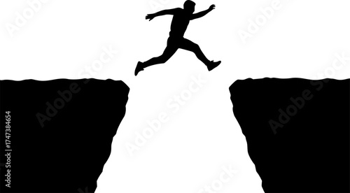 Man jumping silhouette between cliffs at sunrise — motivational success and challenge concept for design and business visuals