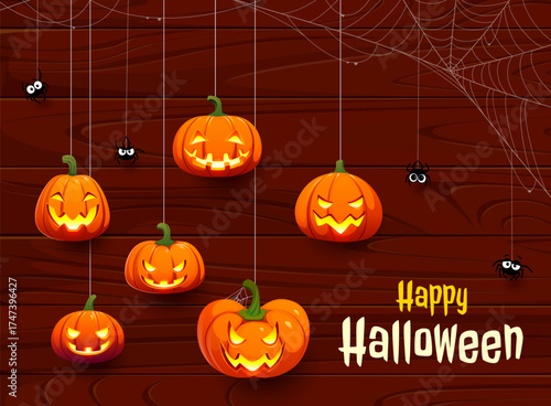Halloween banner with carved pumpkins hanging on threads against a wooden wall background. Creepy spiders and cobwebs, pumpkin lanterns with spooky faces. Halloween horror night holiday greeting card