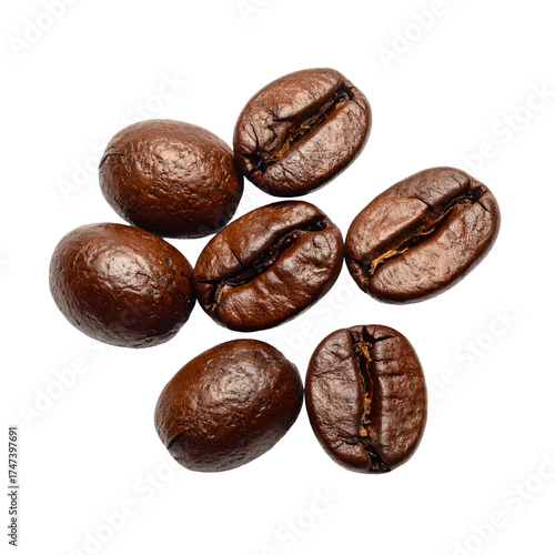 Wallpaper Mural Close-up shot of seven roasted, brown coffee beans scattered on a black background Torontodigital.ca