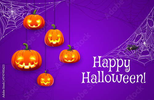 Happy Halloween banner with glowing jack o lantern pumpkins hanging on strings inside stretched spiderwebs. Funny spider on cobweb threads for Halloween holiday vector greeting card or banner