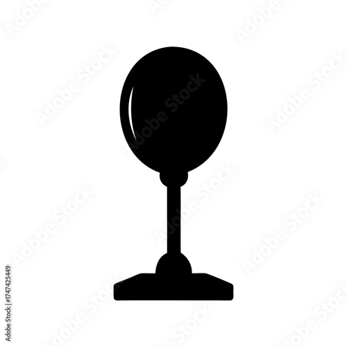 Silhouette of a standing punching ball, isolated on white background, closeup