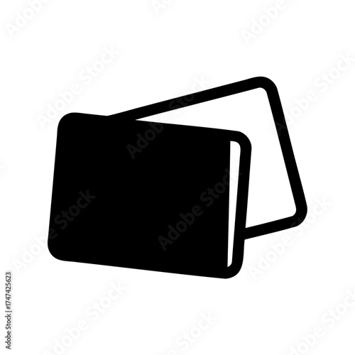Two dark colored books with rounded corners stacked on top of each other