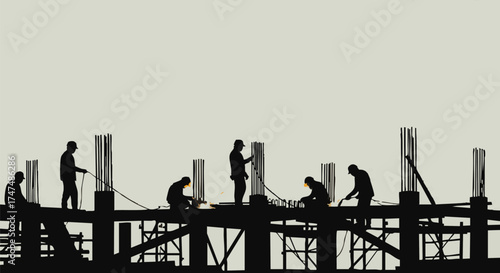 Silhouette of construction workers diligently working on a building site, creating a visual representation of teamwork and progress.