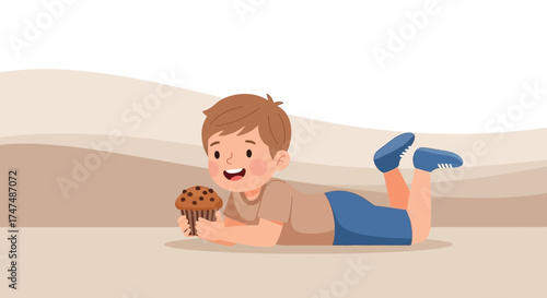 Joyful Child Relaxes While Enjoying a Freshly Baked Muffin Dessert or Treat