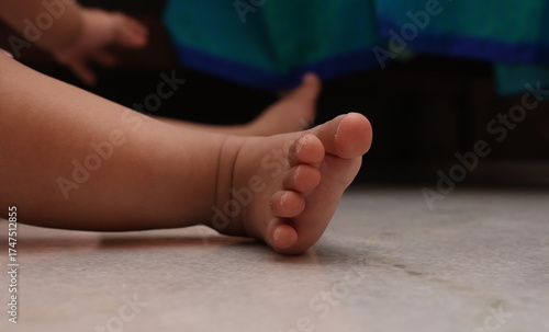 tiny hands and legs of toddler baby
