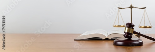 Wooden gavel and law book with balance scale. Justice, law, verdict concept for legal advice, court proceedings, lawyer and judge banner with copy space.