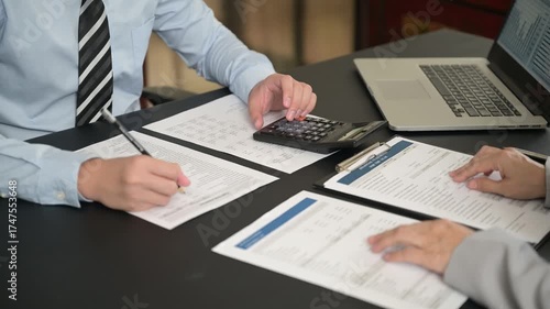 Finance and accountant team working in office for accounting and preparation services for financial statements and cash flow with analyze data insight for finance and taxation planning.	