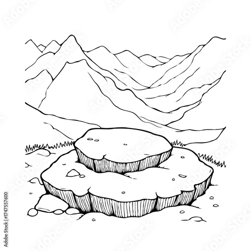 Monochrome landscape with layered rock formation set against a backdrop of rolling mountains,