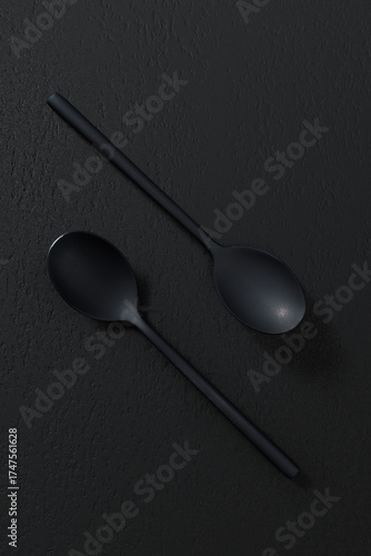 Black spoon on dark background