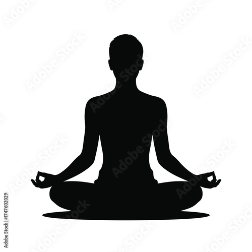 Black silhouette of person meditating in lotus pose yoga