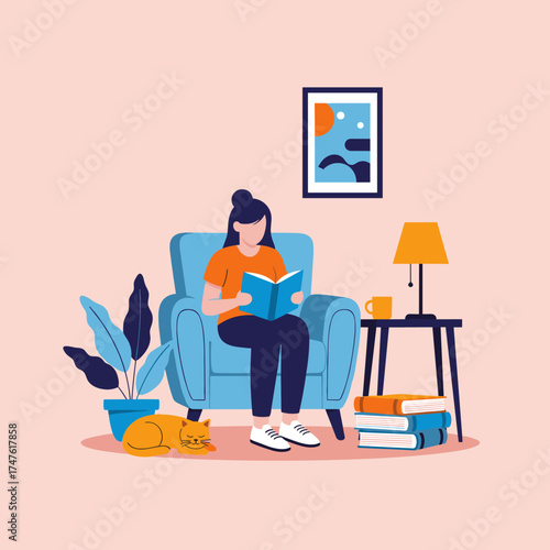 A person sitting in a comfy chair reading a book with a cat sleeping nearby.