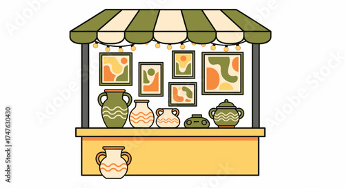 An illustration of a shop stall displaying pottery and framed art pieces under a striped awning.