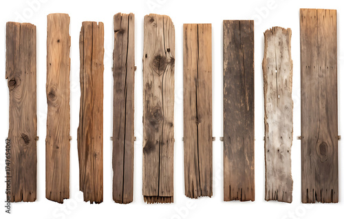 charmingly weathered wooden fence stretches, showcasing a diverse collection of wooden posts that exude a sense of rustic elegance.
