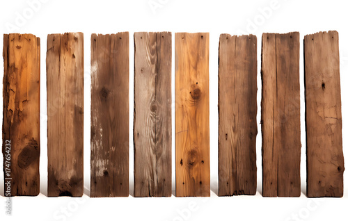 charmingly weathered wooden fence stretches, showcasing a diverse collection of wooden posts that exude a sense of rustic elegance.