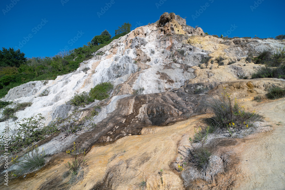 Fototapeta premium Parco naturale dei Mulini, public park with hot springs and dismantled system of grain mills at Bagno Vignoni, town in the province of Siena, Italy