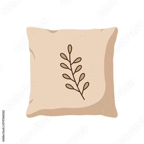 Decorative pillow with a simple botanical sprig illustration.