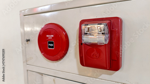 Photos a fire alarm system, specifically a manual pull station and a horn or strobe not