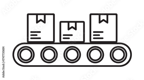 Cardboard boxes moving along a conveyor belt in a warehouse