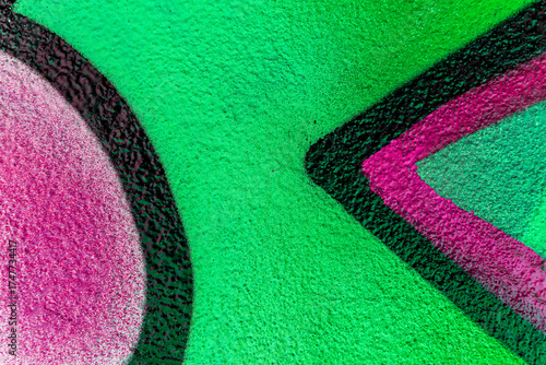 Art under ground. Beautiful street art graffiti background. The wall is decorated with abstract drawings house paint. Modern style urban culture of street youth. Abstract picture on wall