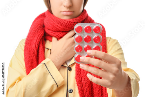 Ill young woman with throat...